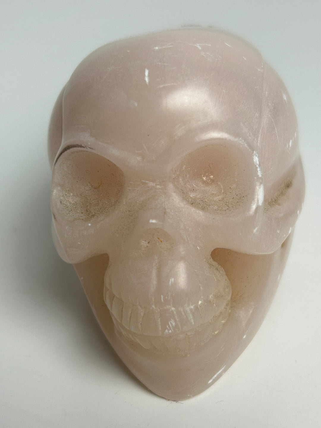Sculptuur – Schedel in roze calciet | 15 x 5,5 x 7 cm