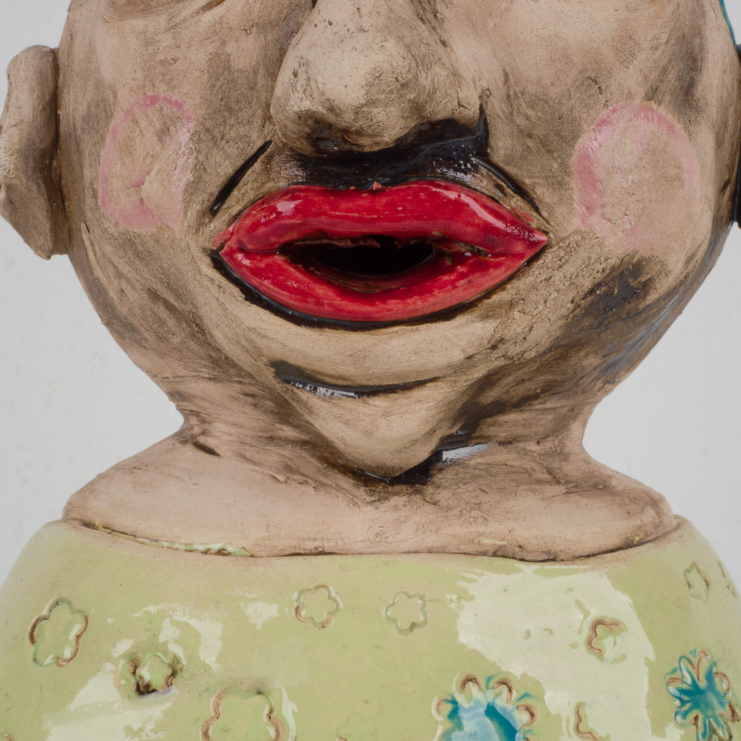 Colorful handmade ceramic statue – The Traveler