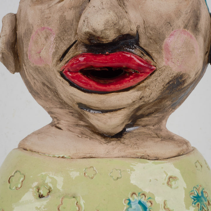 Colorful handmade ceramic statue – The Traveler