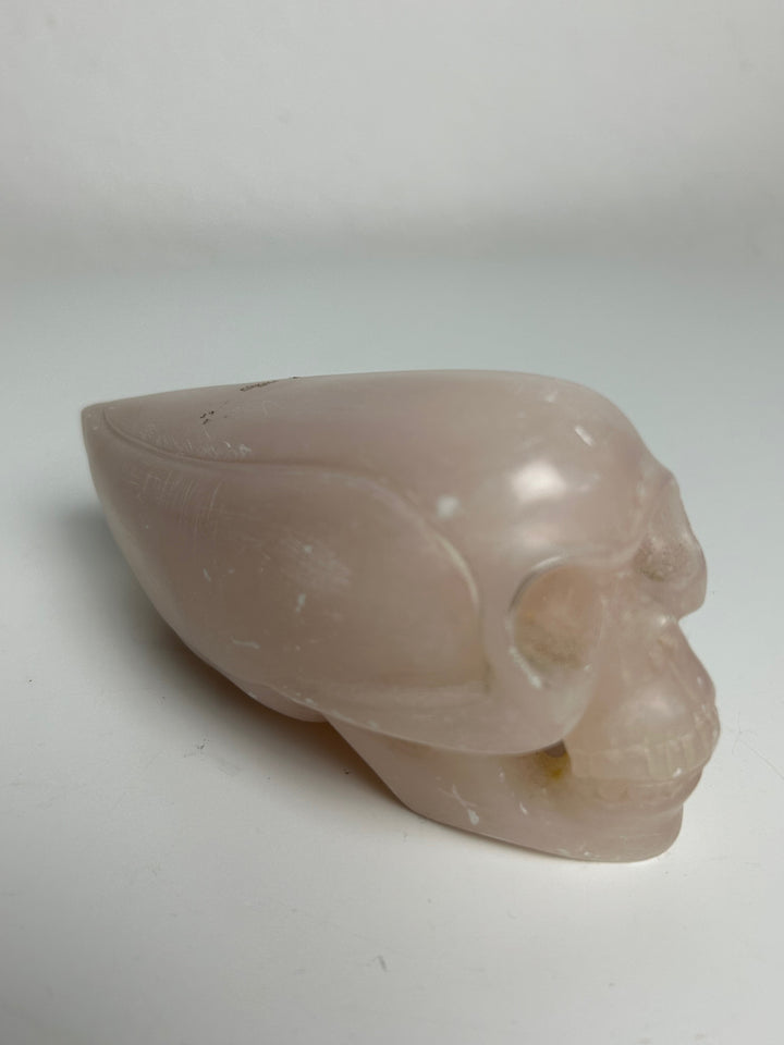 Sculptuur – Schedel in roze calciet | 15 x 5,5 x 7 cm