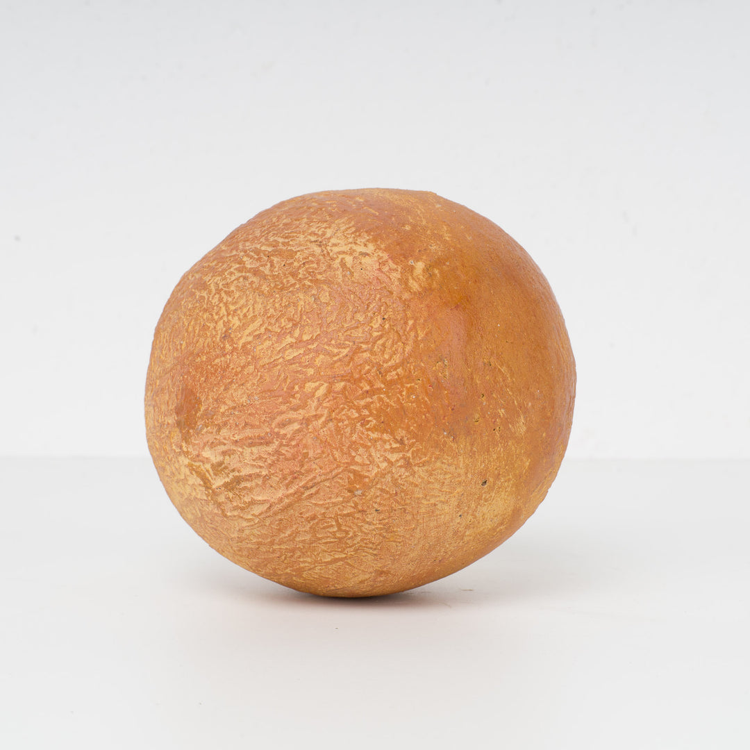 Decoratieve sculptuur van een citrusvrucht – steen of gips – 15 x 12 x 11 cm