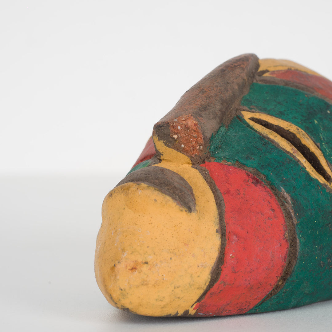 Small African decorative mask – green, red and yellow