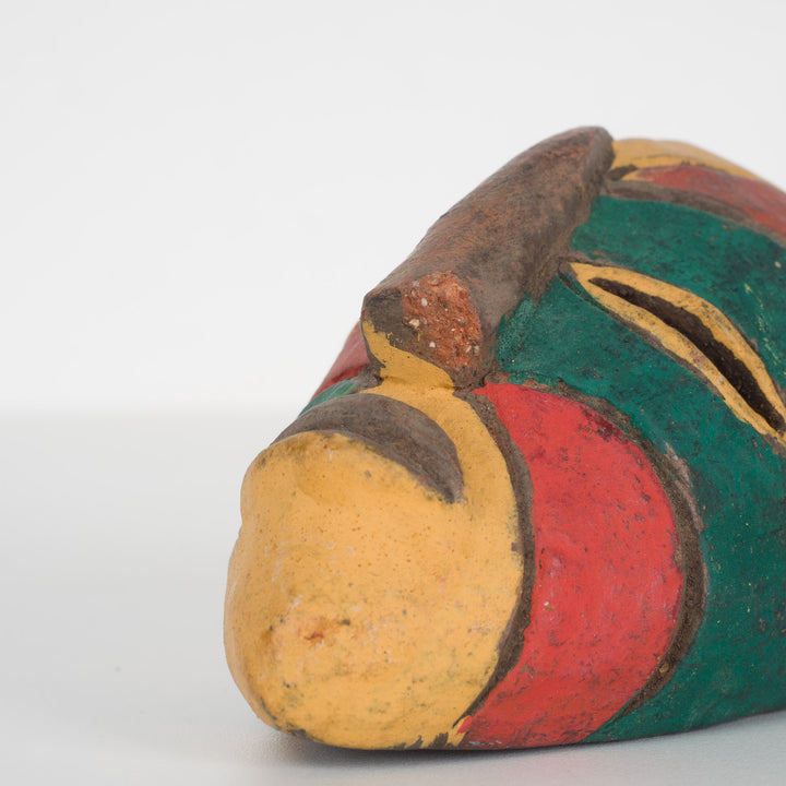 Small African decorative mask – green, red and yellow