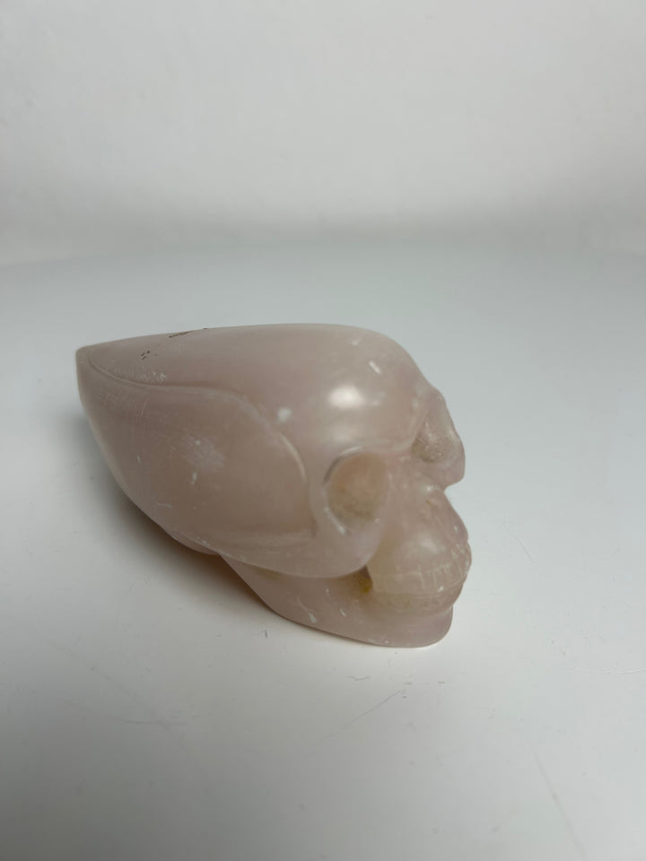 Sculptuur – Schedel in roze calciet | 15 x 5,5 x 7 cm
