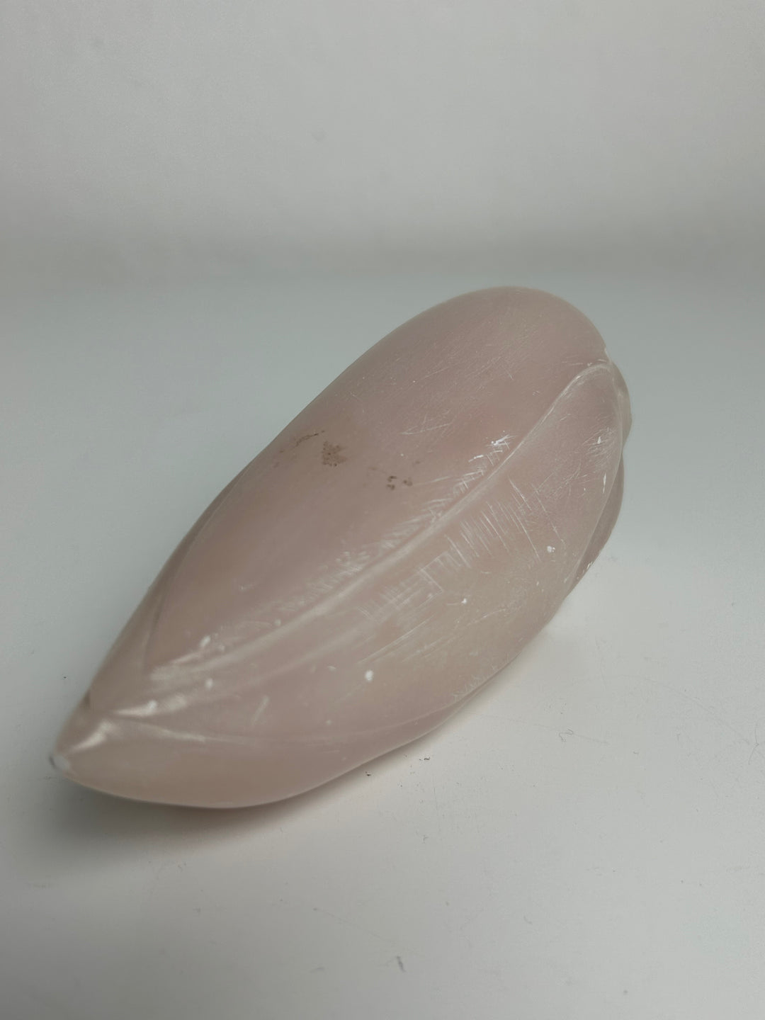 Sculptuur – Schedel in roze calciet | 15 x 5,5 x 7 cm