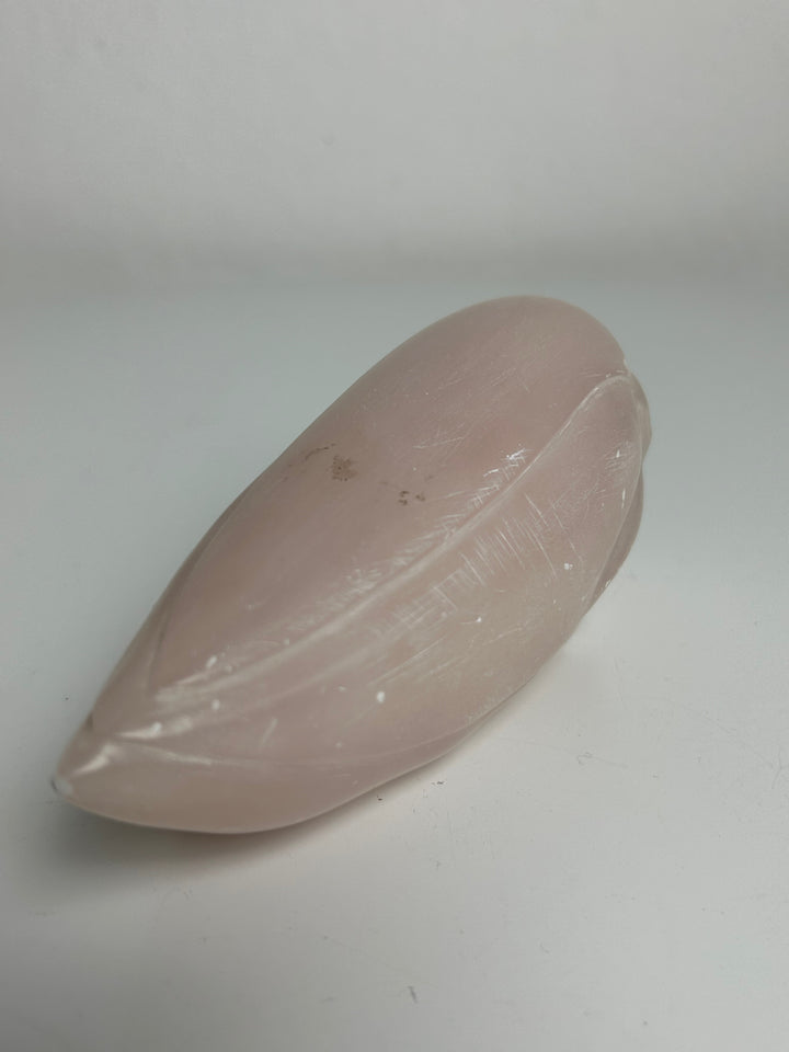 Sculptuur – Schedel in roze calciet | 15 x 5,5 x 7 cm