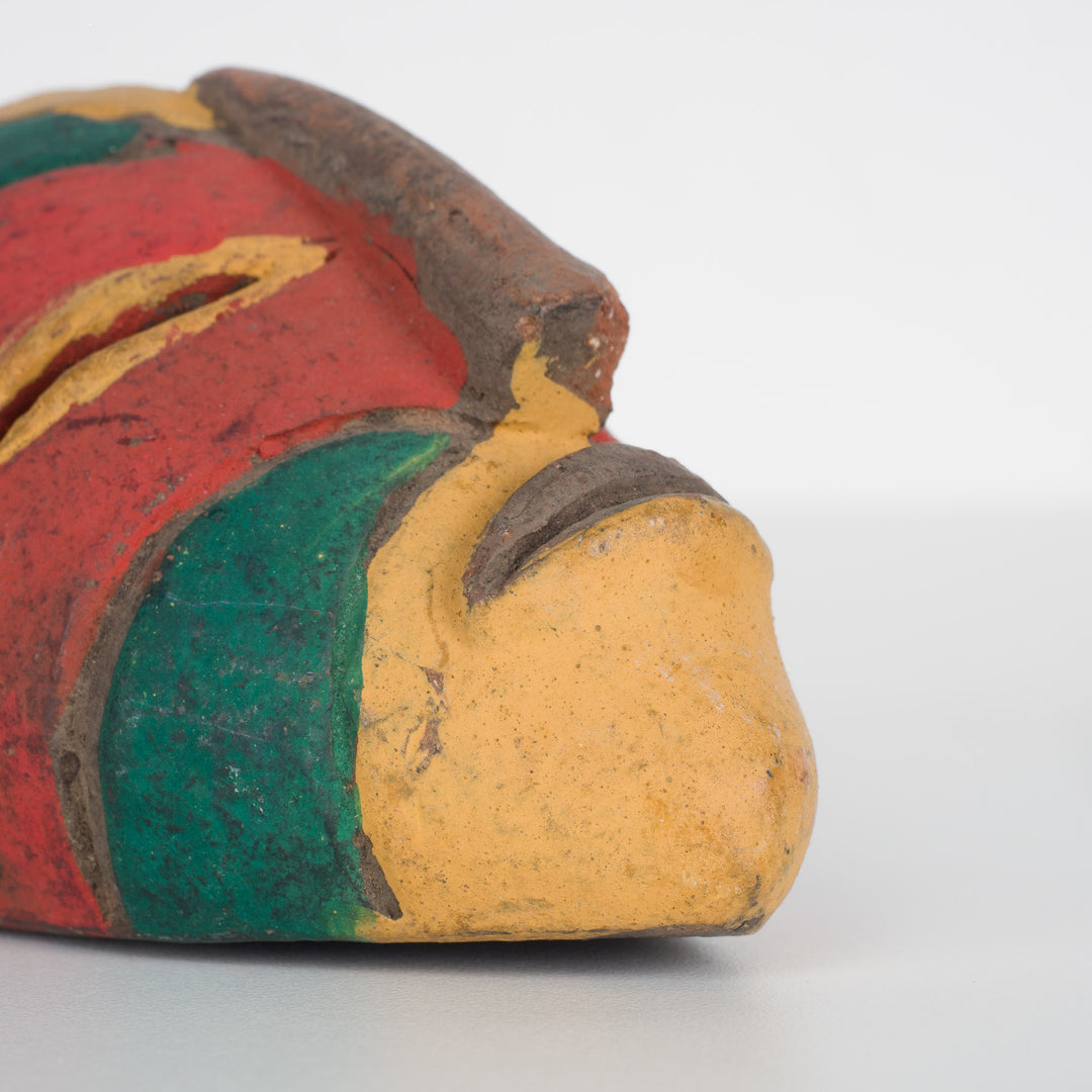 Small African decorative mask – green, red and yellow