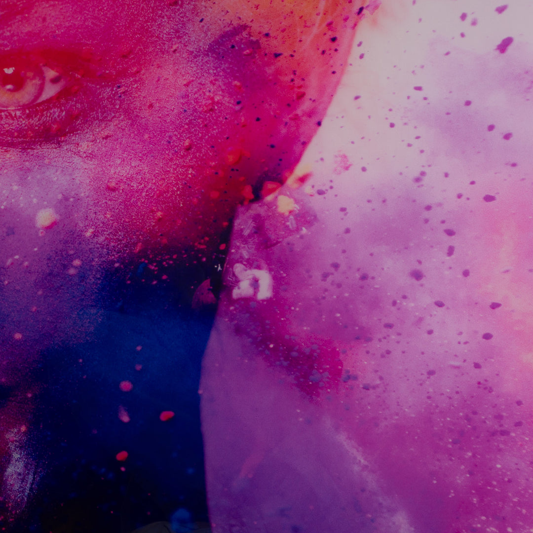 Beautiful photo of a young woman on glass in pink