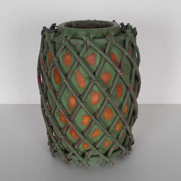 Authentic terracotta vase with wooden wickerwork