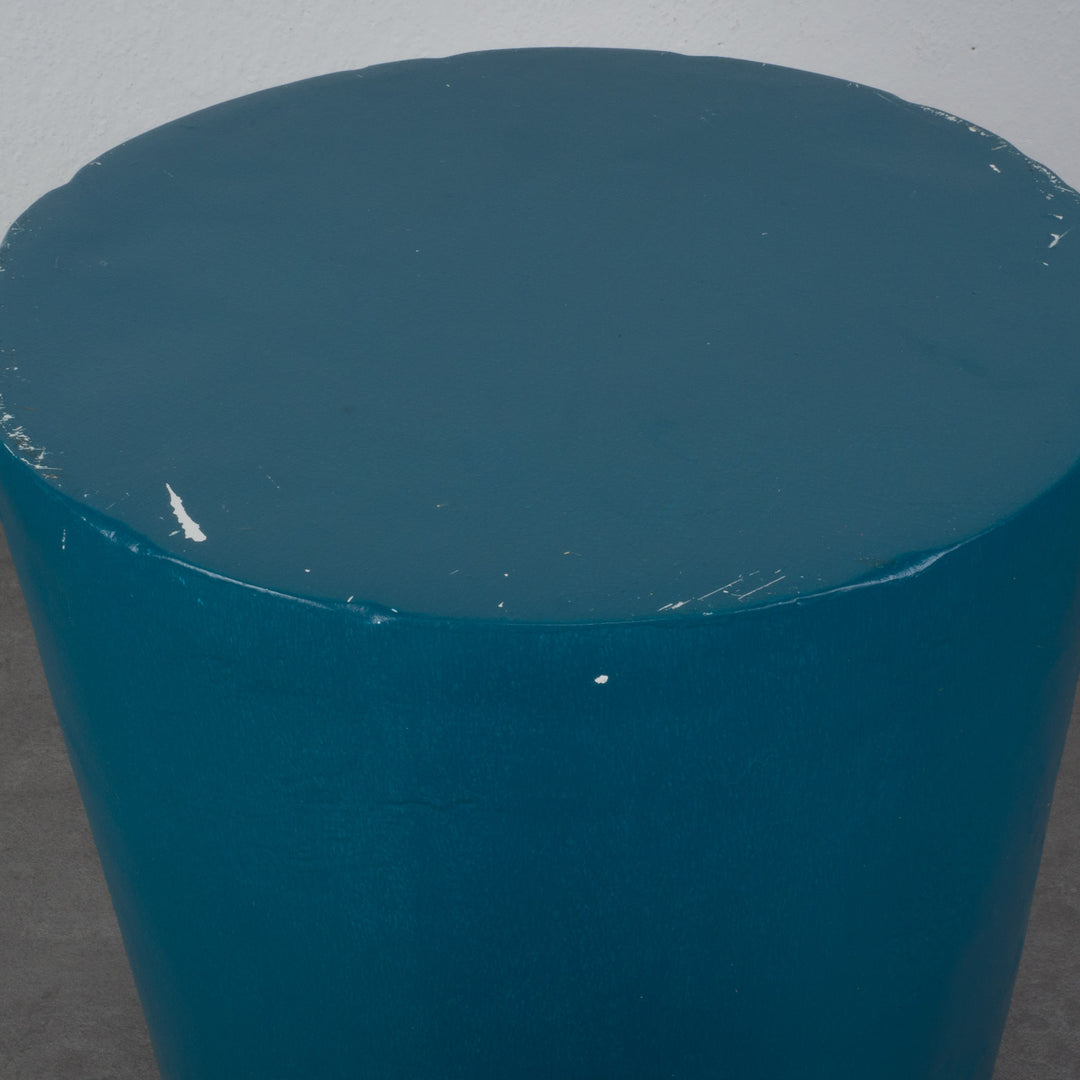 Round stool in polyester in petrol blue color