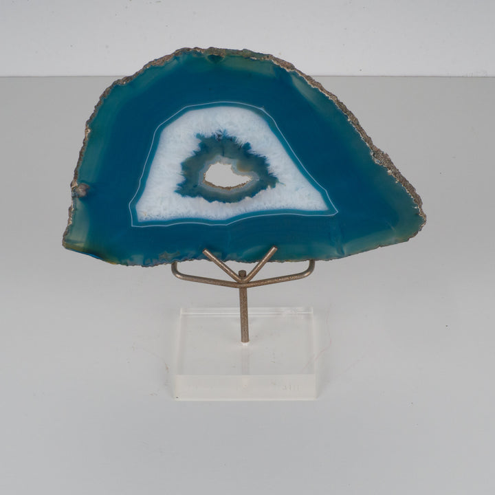 Blue agate stone on pedestal