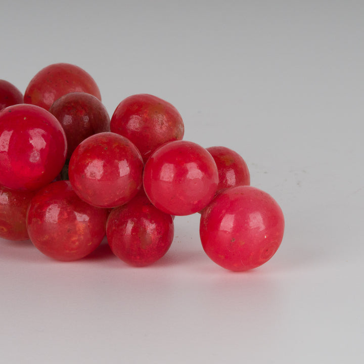 Bunch of grapes with grapes in red alabaster stone