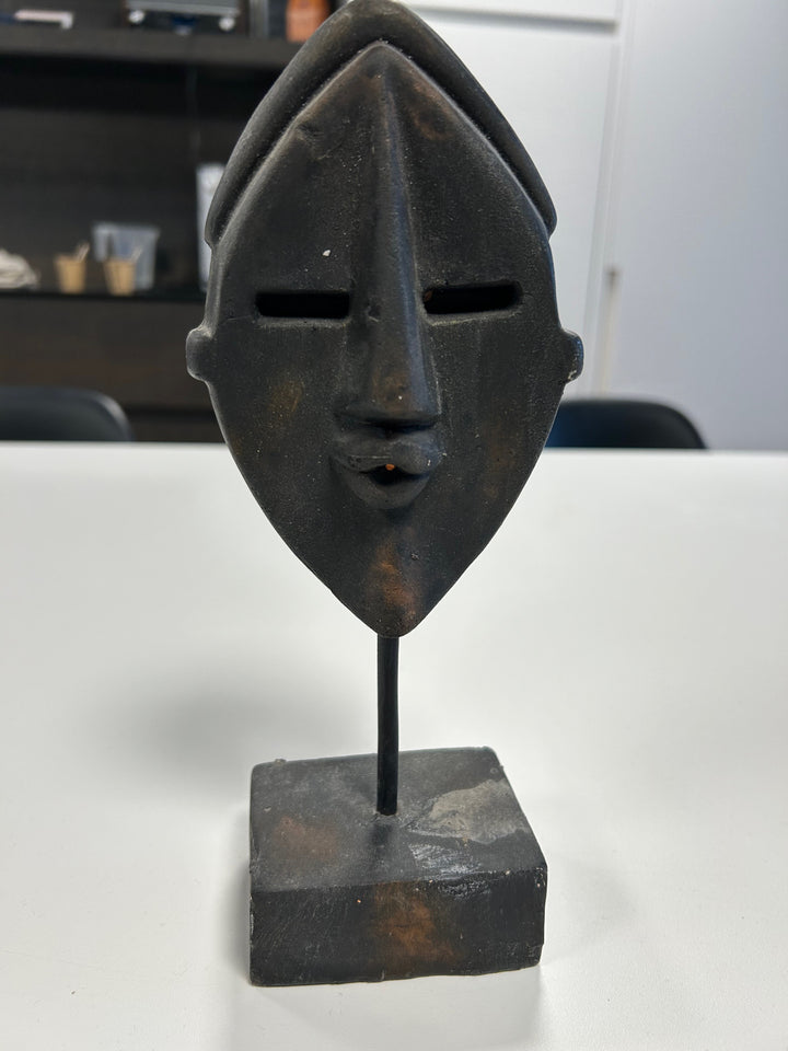 Dark Brown Angular Mask in Stone on Plinth – Mystical Elegance