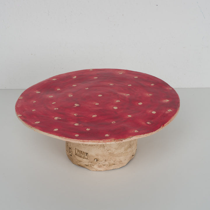 Glazed mushroom-shaped platter with white dots