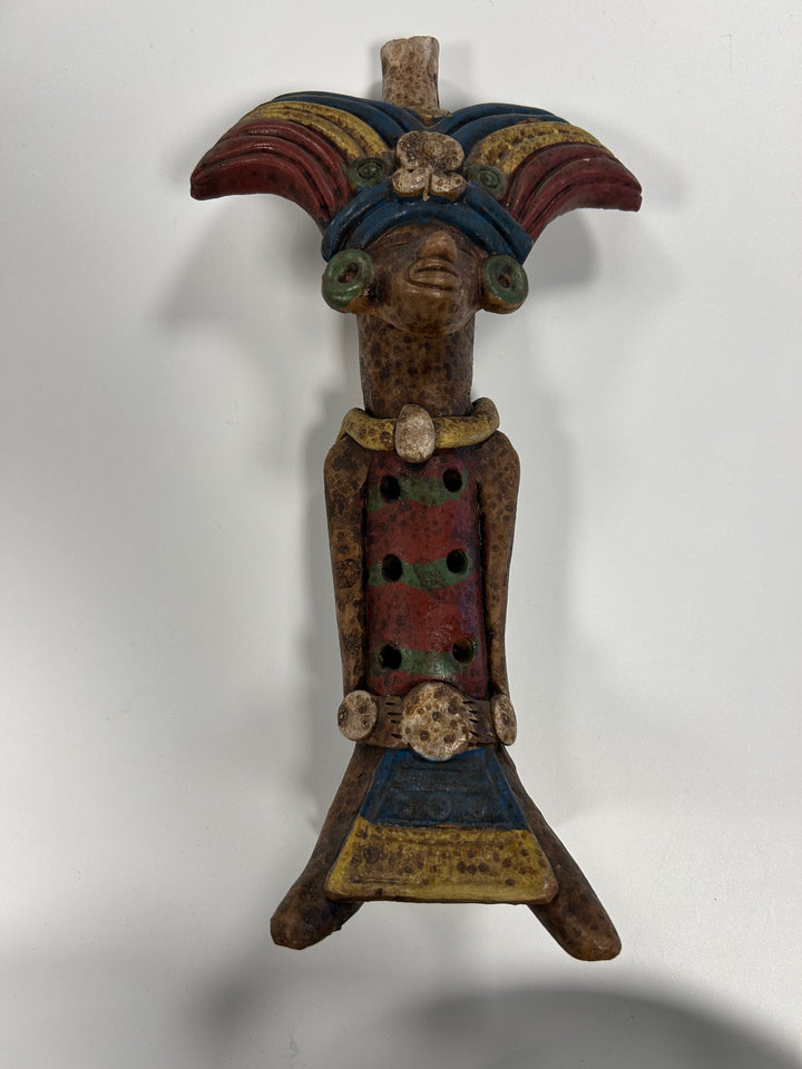 Flute in the shape of a polychrome statue from Mexico