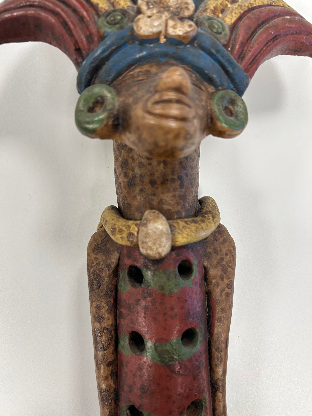 Flute in the shape of a polychrome statue from Mexico