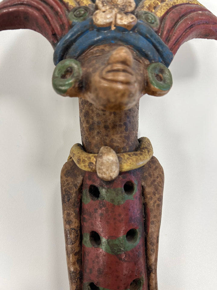 Flute in the shape of a polychrome statue from Mexico