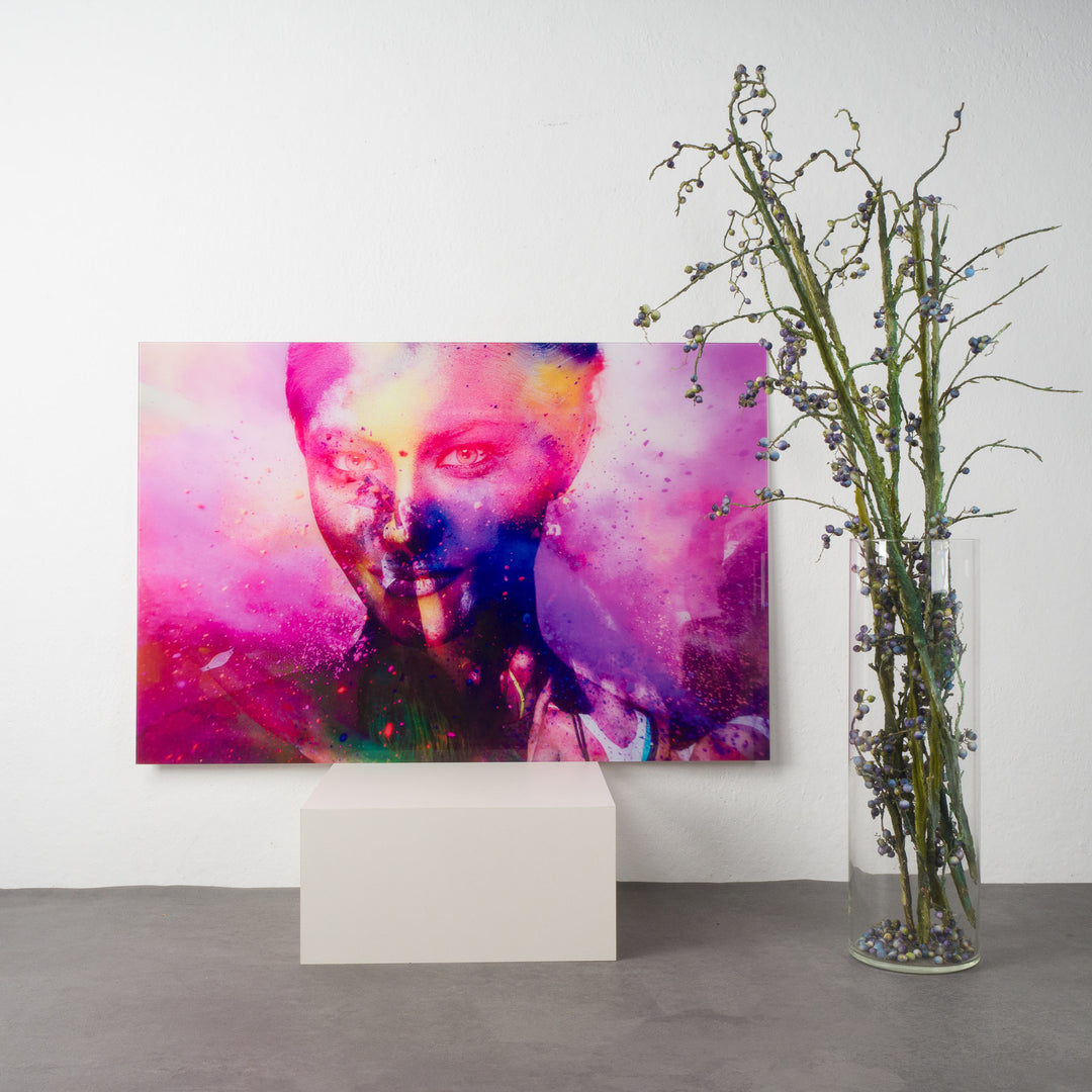 Beautiful photo of a young woman on glass in pink