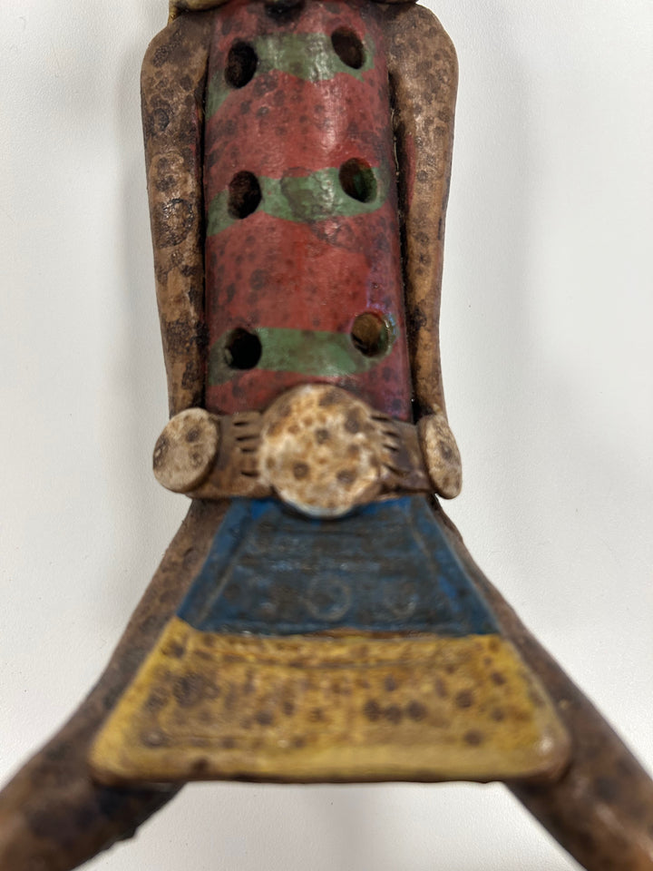 Flute in the shape of a polychrome statue from Mexico