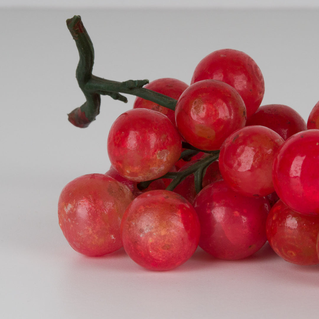 Bunch of grapes with grapes in red alabaster stone