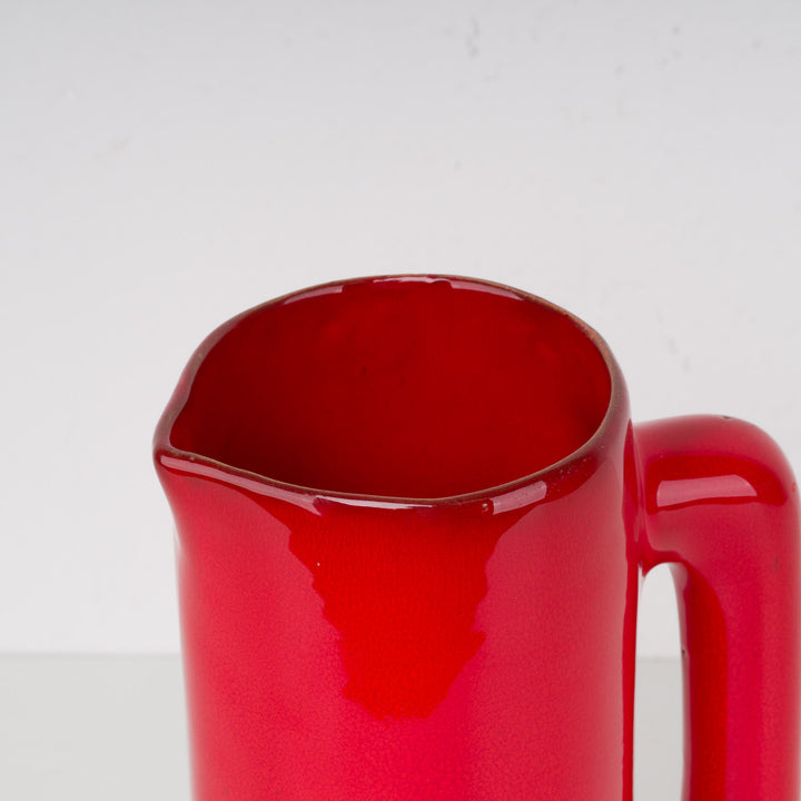 Red glazed ceramic vase