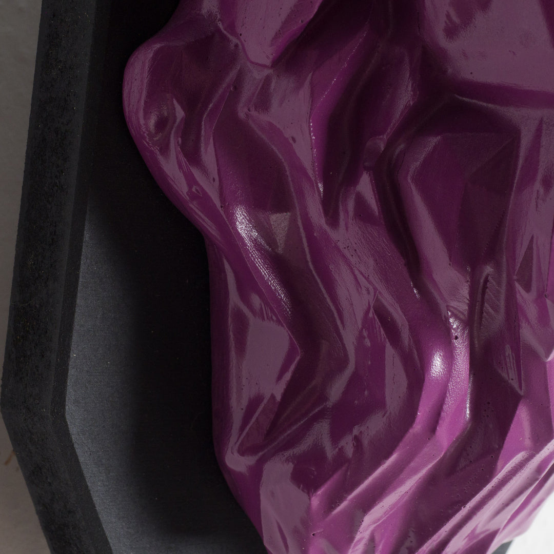 Artwork of a lion head in purple in resin