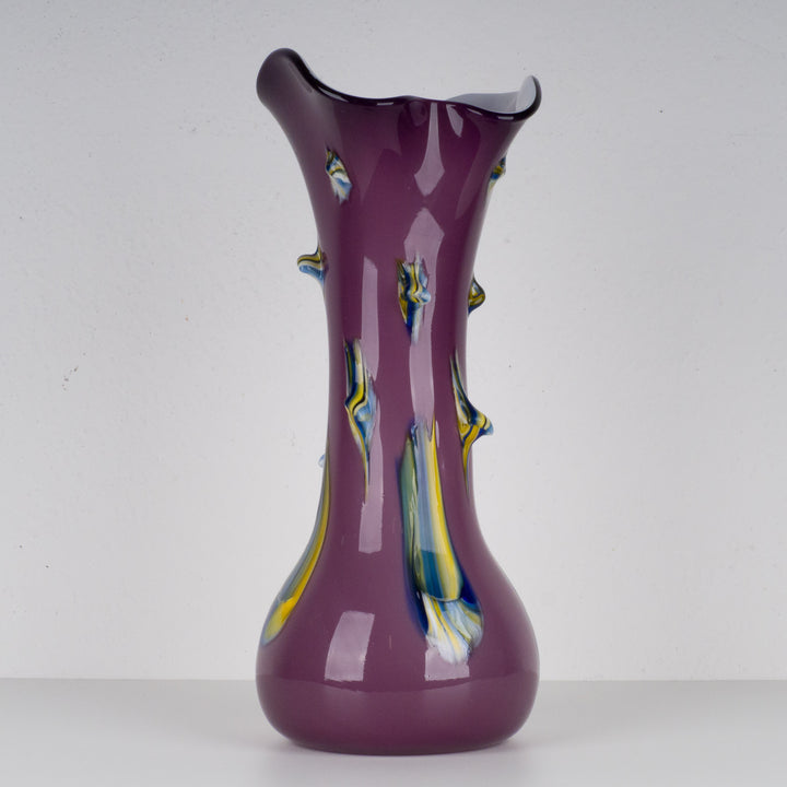 Modern large purple glass vase with studs.