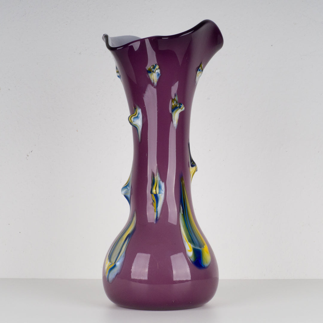 Modern large purple glass vase with studs.