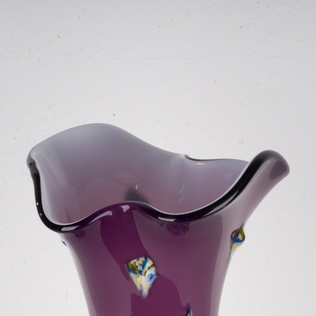 Modern large purple glass vase with studs.