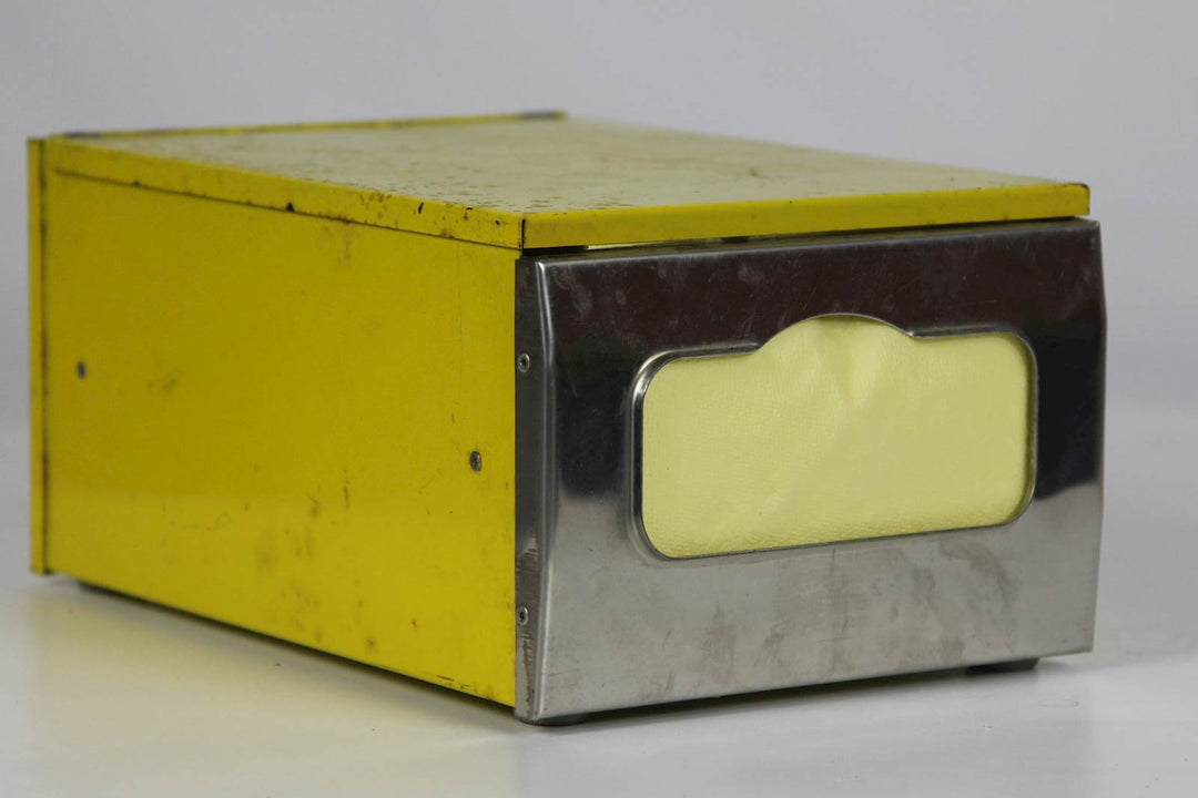 Vintage gele metalen servettenhouder - De Tuin Der Kunsten