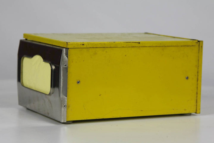 Vintage gele metalen servettenhouder - De Tuin Der Kunsten