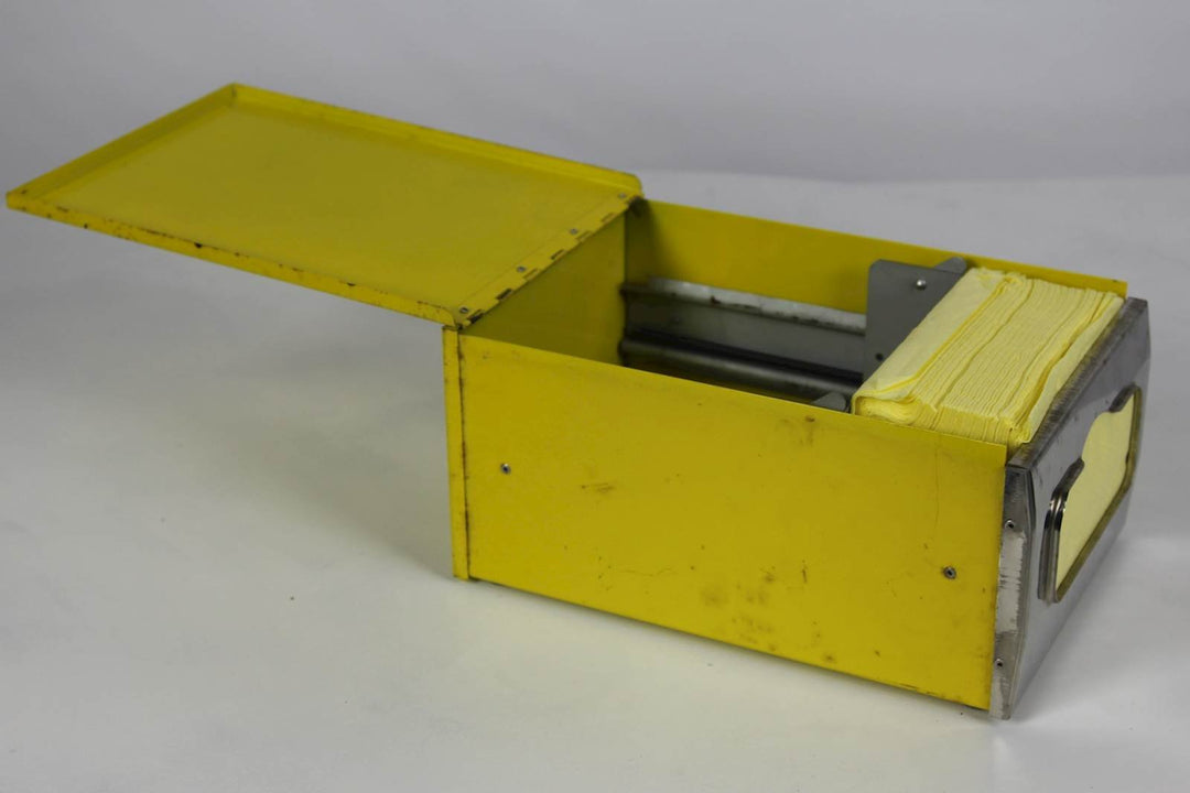 Vintage gele metalen servettenhouder - De Tuin Der Kunsten